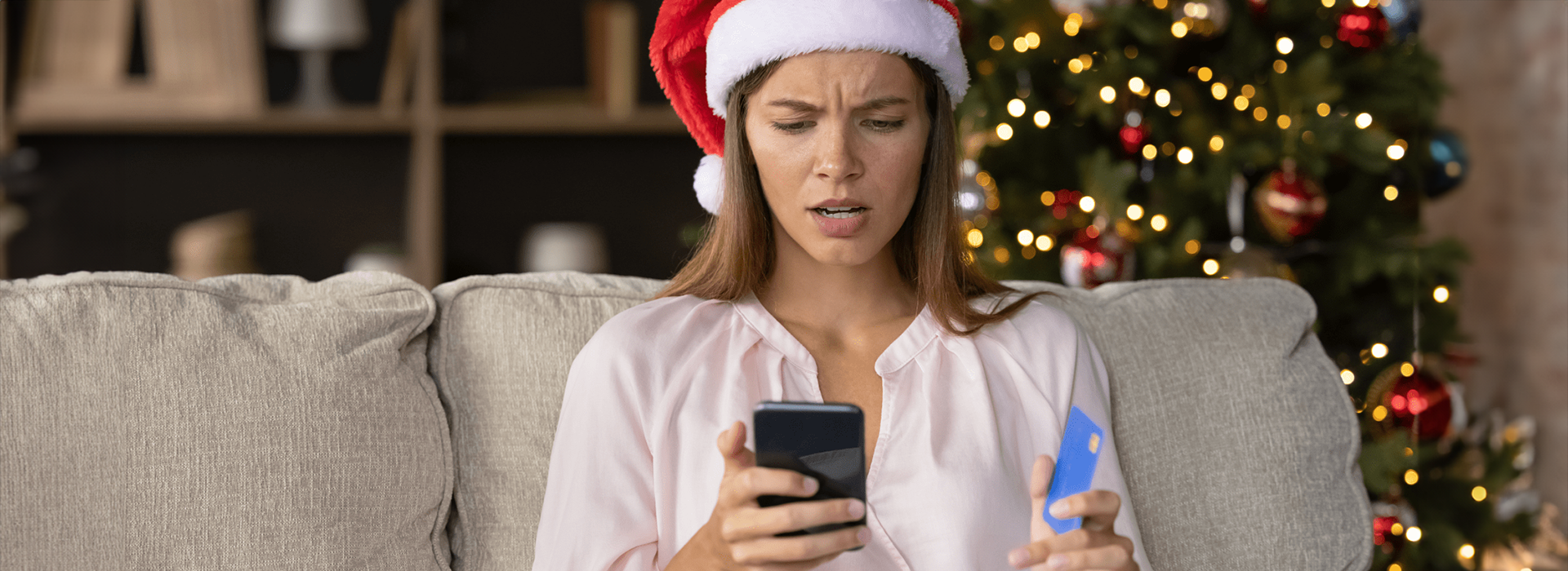 Woman shopping on mobile during holidays